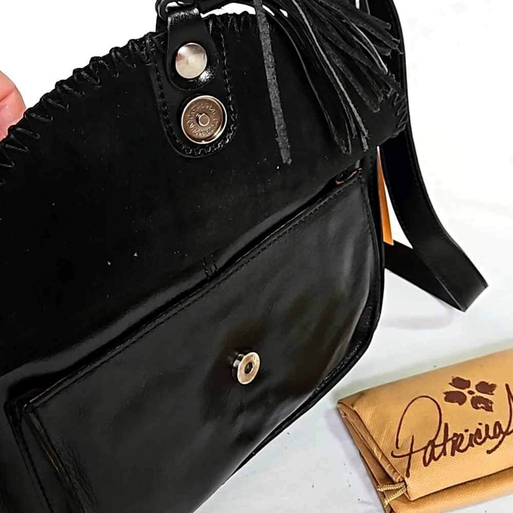 Patricia Nash vintage distressed leather Camila hobo shoulder bag.